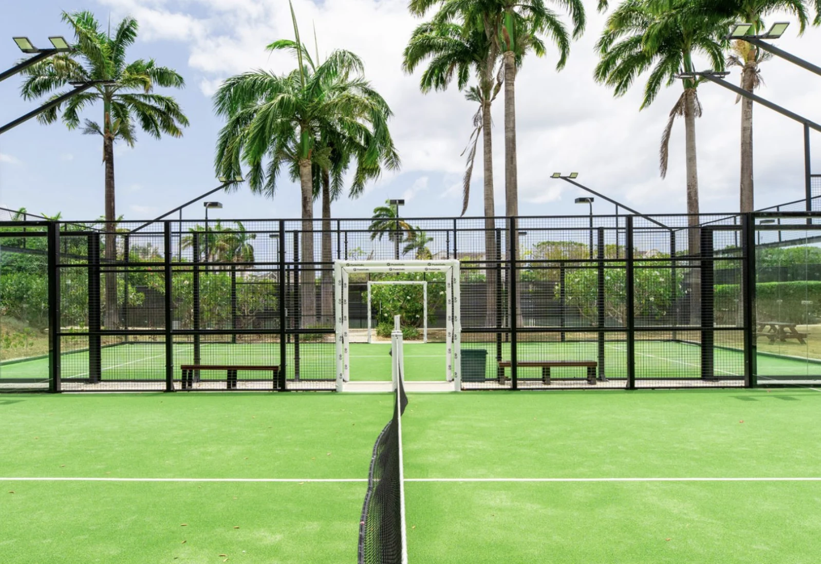 Floodlit padel courts at Sugar Hill