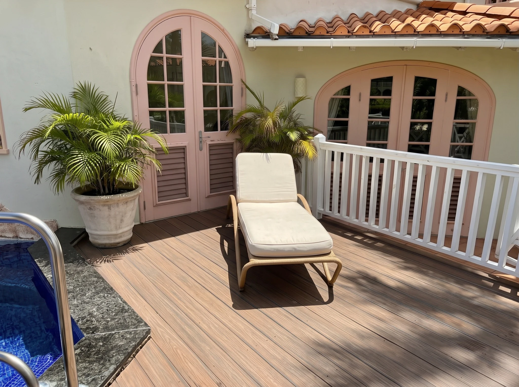 Poolside decking beside the plunge pool at Palm Breeze Villa